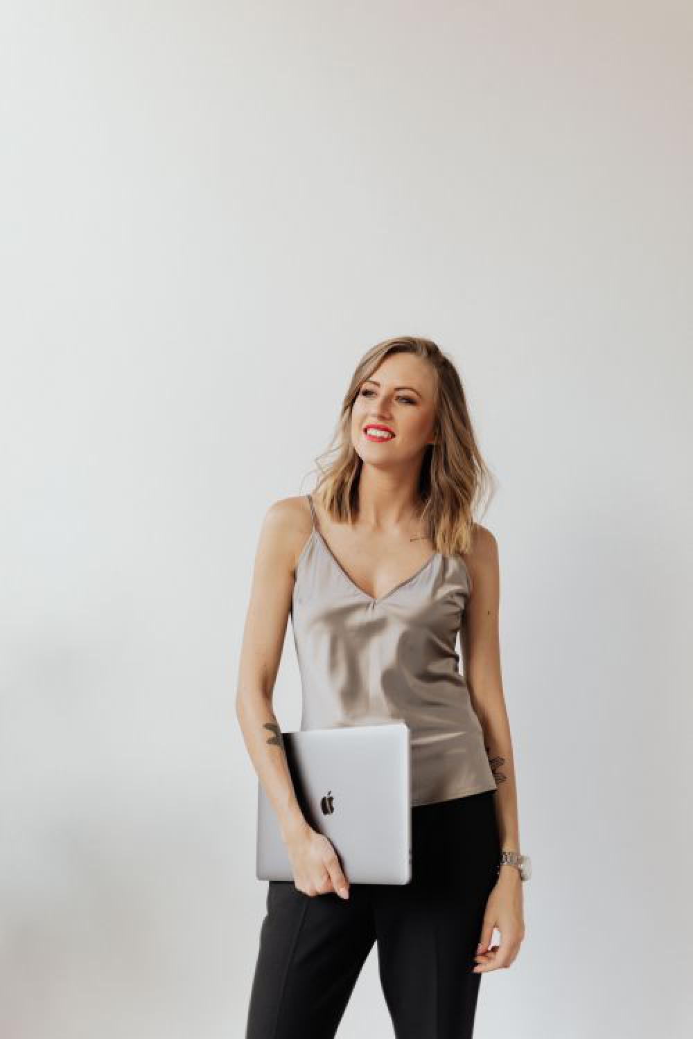 Pretty business woman with a laptop Pretty business woman with a laptop