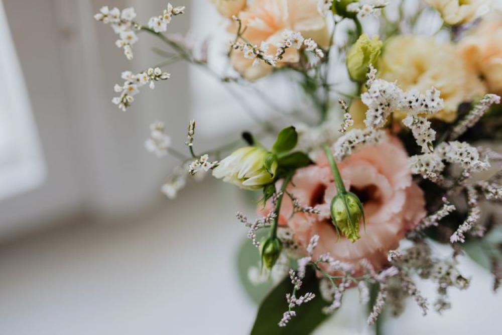 A small pastel bouquet in a glass vase A small pastel bouquet in a glass vase