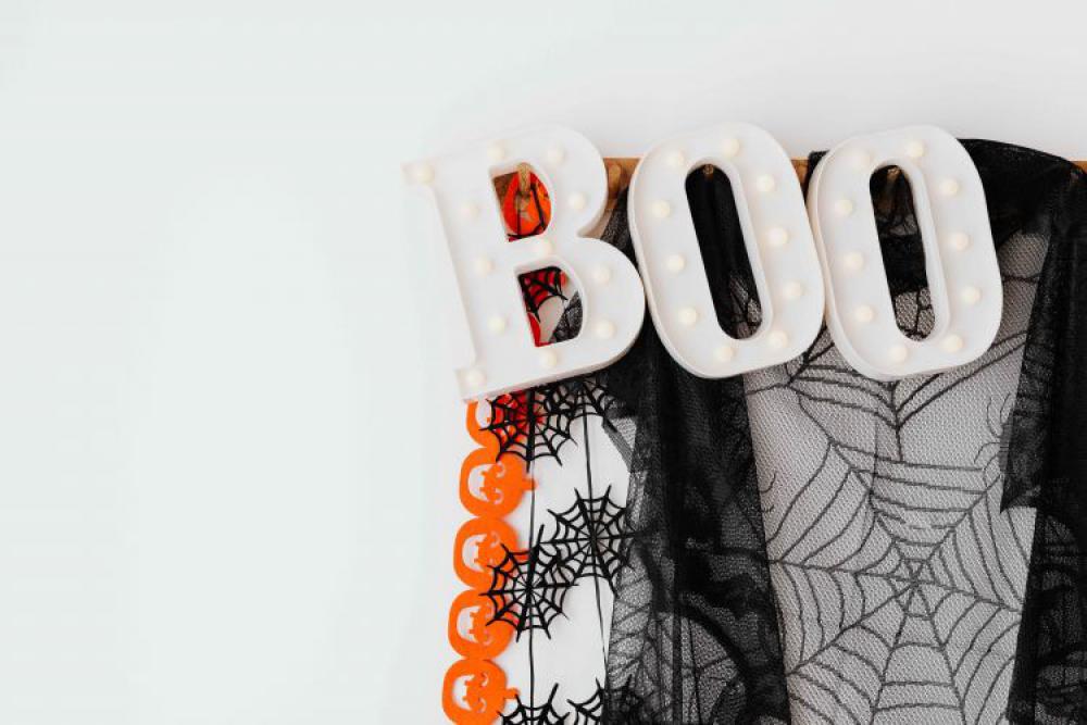 Halloween decorations on a white wall Halloween decorations on a white wall