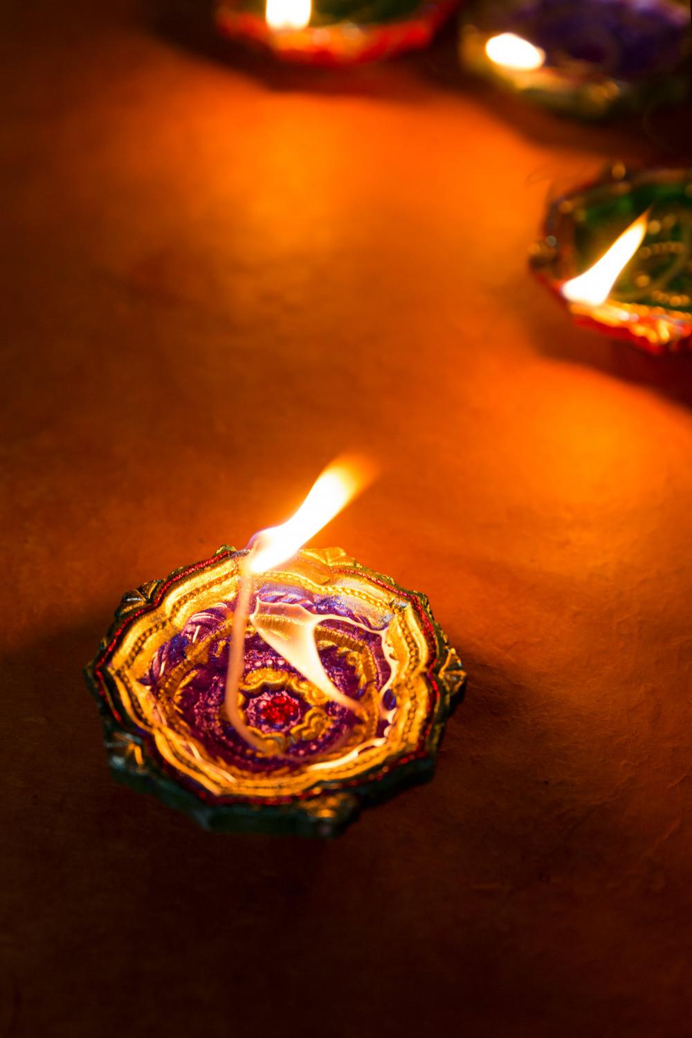 A Wick Oil Candle Burns In The Dark Photo A Wick Oil Candle Burns In The Dark Photo