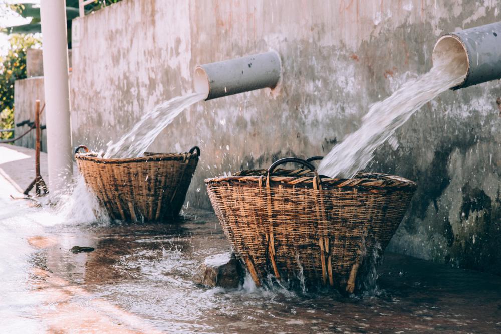Water Flowing Over Wicker Baskets Photo Water Flowing Over Wicker Baskets Photo