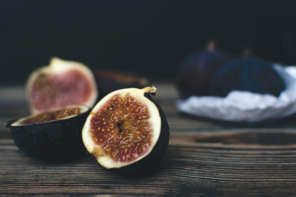 Fresh ripe figs cut in half Fresh ripe figs cut in half