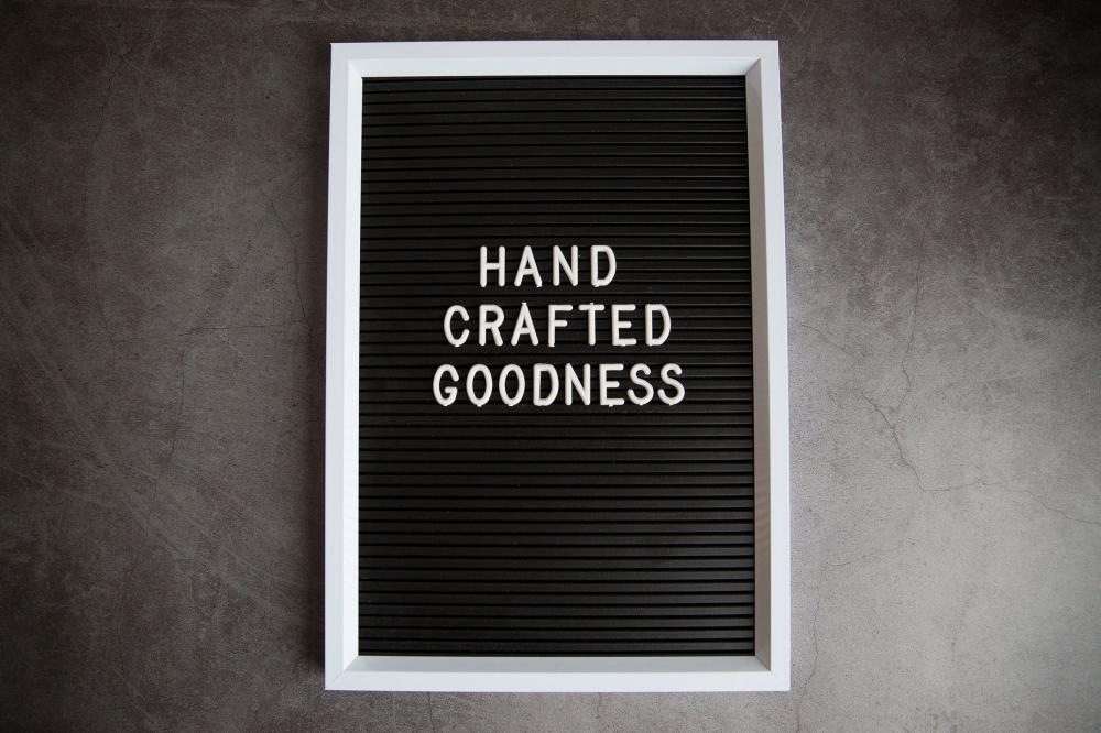 Handcrafted Goodness Sign On Stone Photo Handcrafted Goodness Sign On Stone Photo
