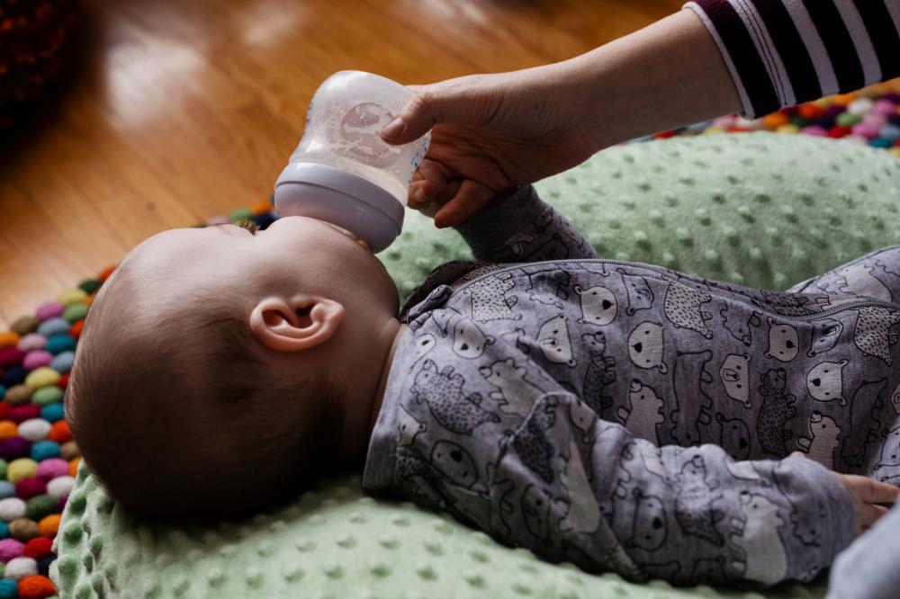 Baby Feeding on Beanbag Photo Baby Feeding on Beanbag Photo