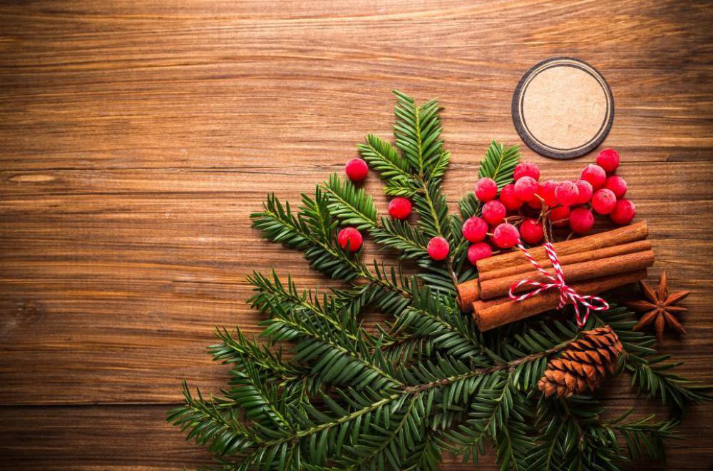 Overhead view of pine tree leaves and red berries Overhead view of pine tree leaves and red berries