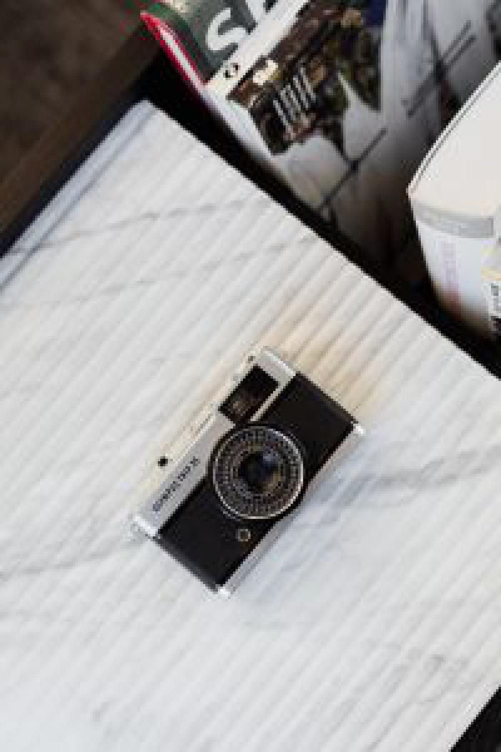 Old camera on marble Old camera on marble