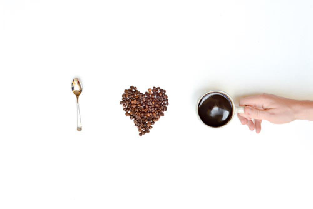 I Love Coffee Concept With Mans Hand, cup and beans I Love Coffee Concept With Mans Hand, cup and beans