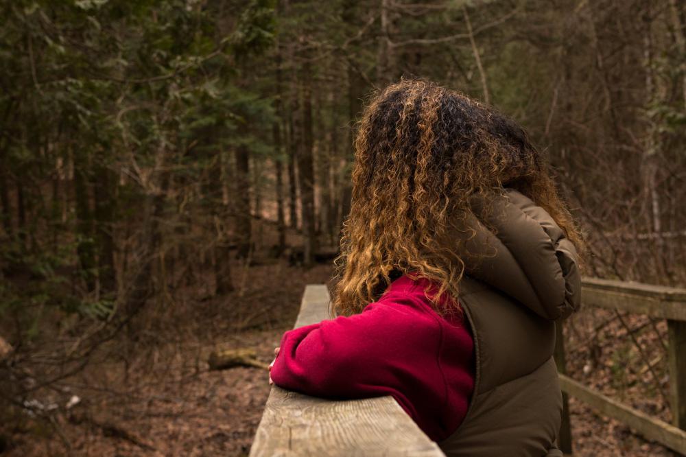 Woman Takes A Moment While On A Hike Photo Woman Takes A Moment While On A Hike Photo