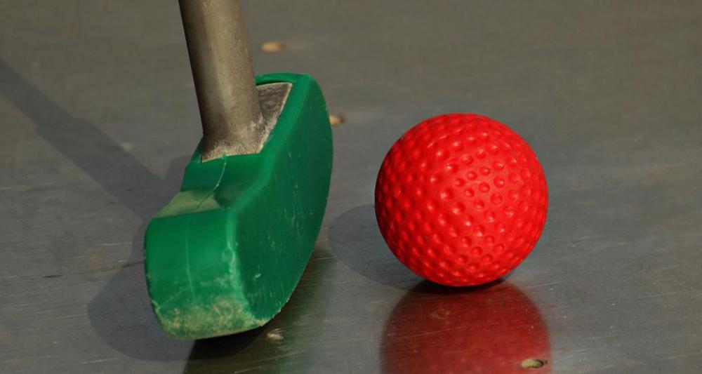 Mini golf - colorful ball and putter Mini golf - colorful ball and putter