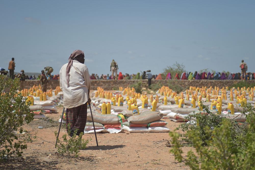 people, man, standing, donation, distribution, food crisis, aid, assistance, refugees camp people, man, standing, donation, distribution, food crisis, aid, assistance, refugees camp