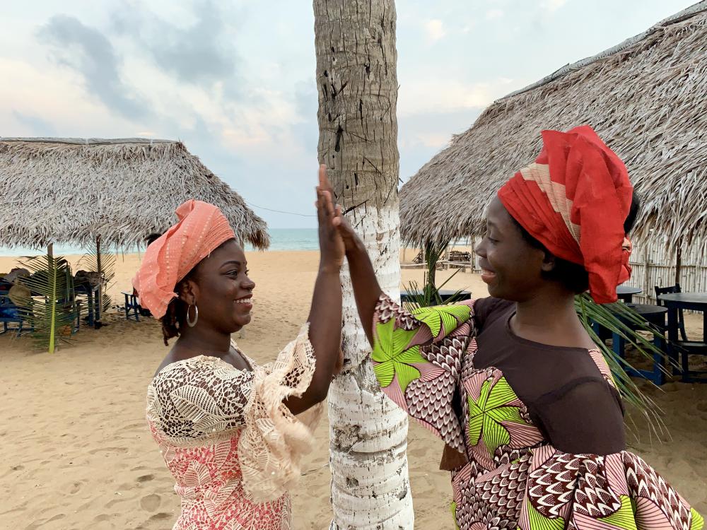 people, women, girls, duo, high five, smile, facial expression, gestural, beach, traditional hats, happiness, joy, celebration people, women, girls, duo, high five, smile, facial expression, gestural, beach, traditional hats, happiness, joy, celebration