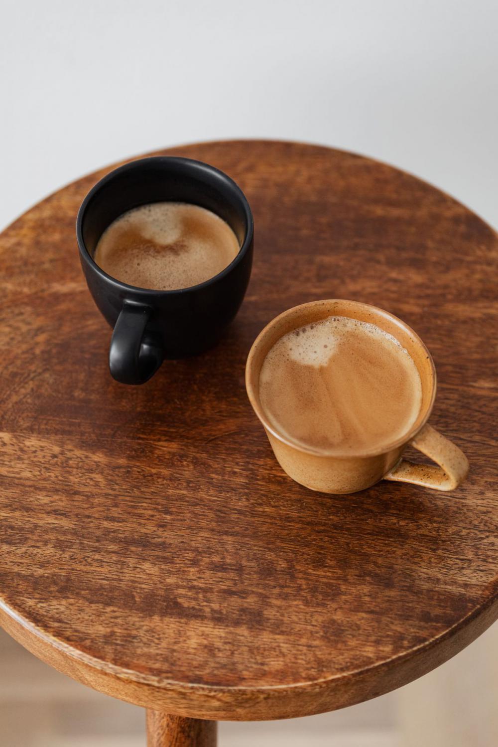 Cup of coffee on wooden table Cup of coffee on wooden table