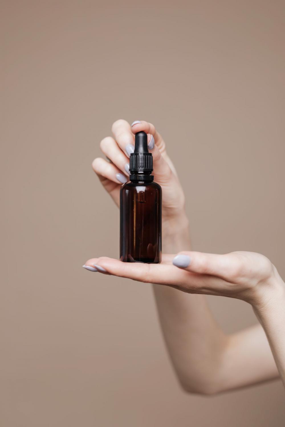 Bottle of essential oil Bottle of essential oil