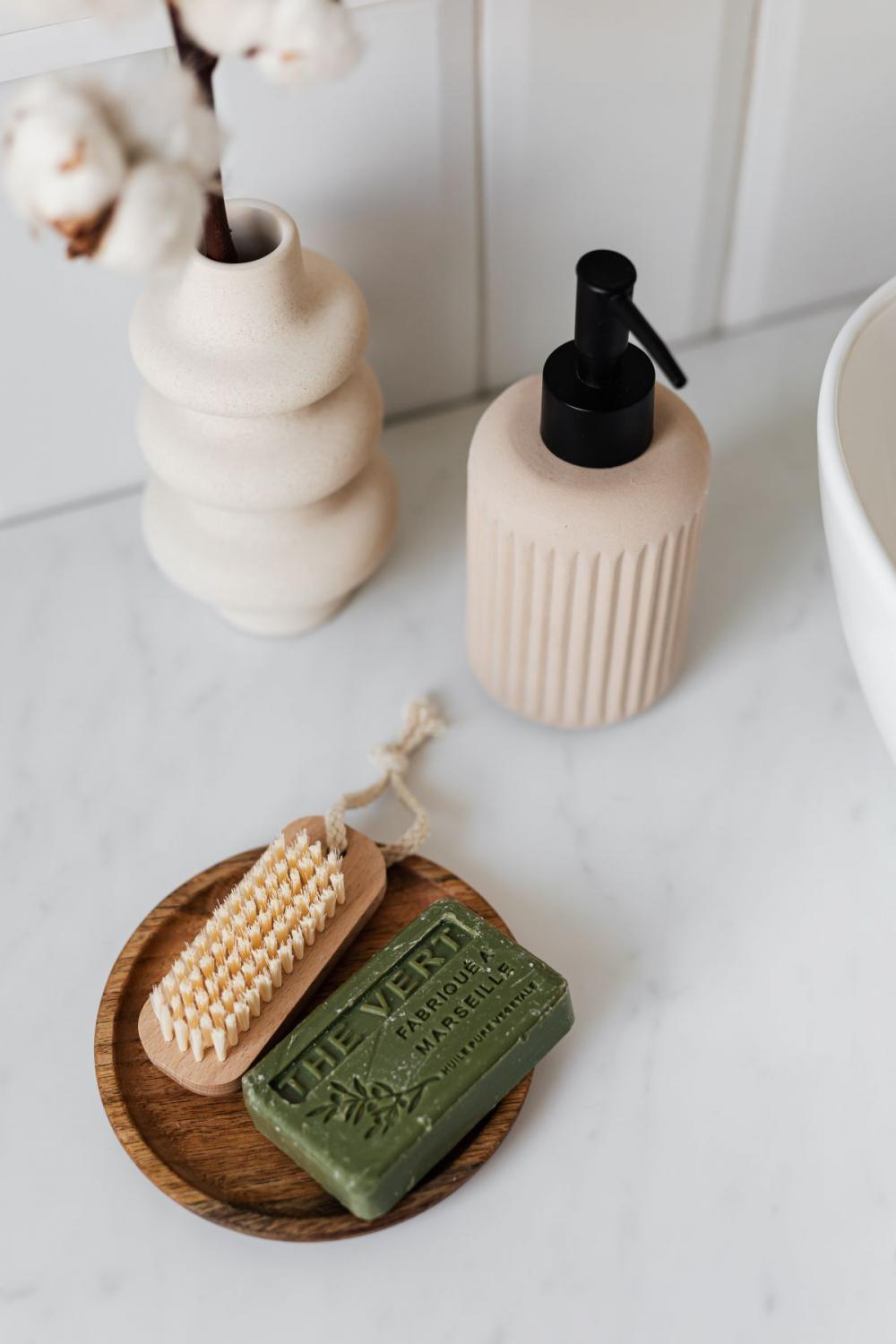 Olive soap on a wooden tray Olive soap on a wooden tray
