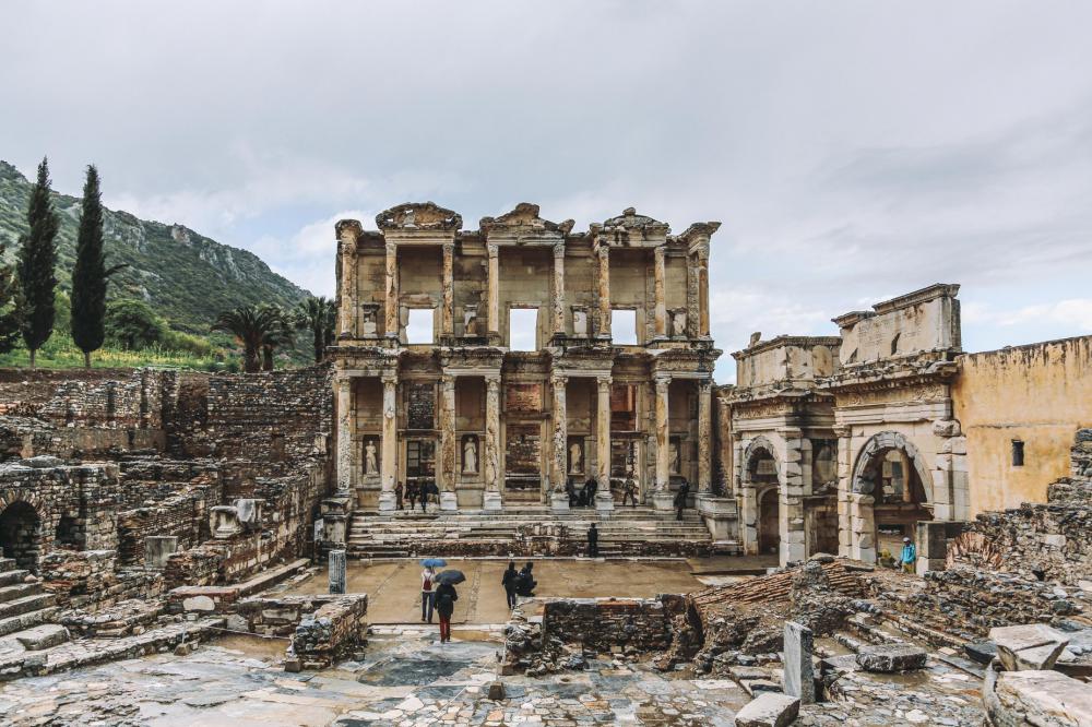 Tourists Wander Around Ruins Photo Tourists Wander Around Ruins Photo