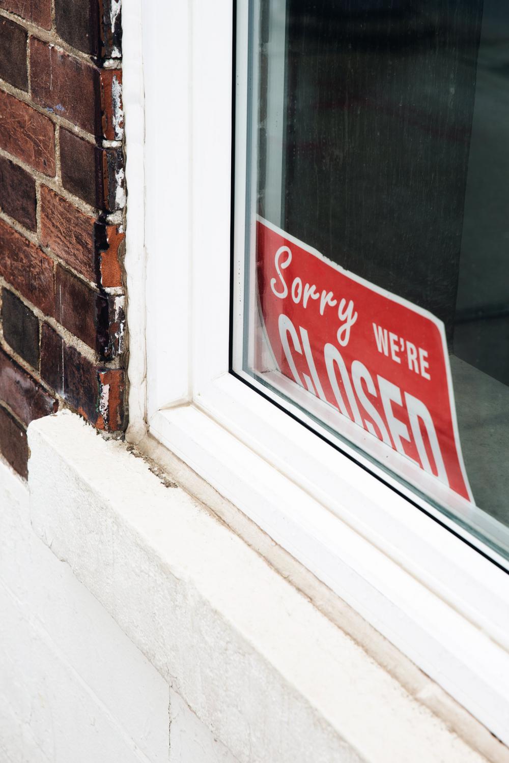 Sorry We're Closed Sign In Window Photo Sorry We're Closed Sign In Window Photo