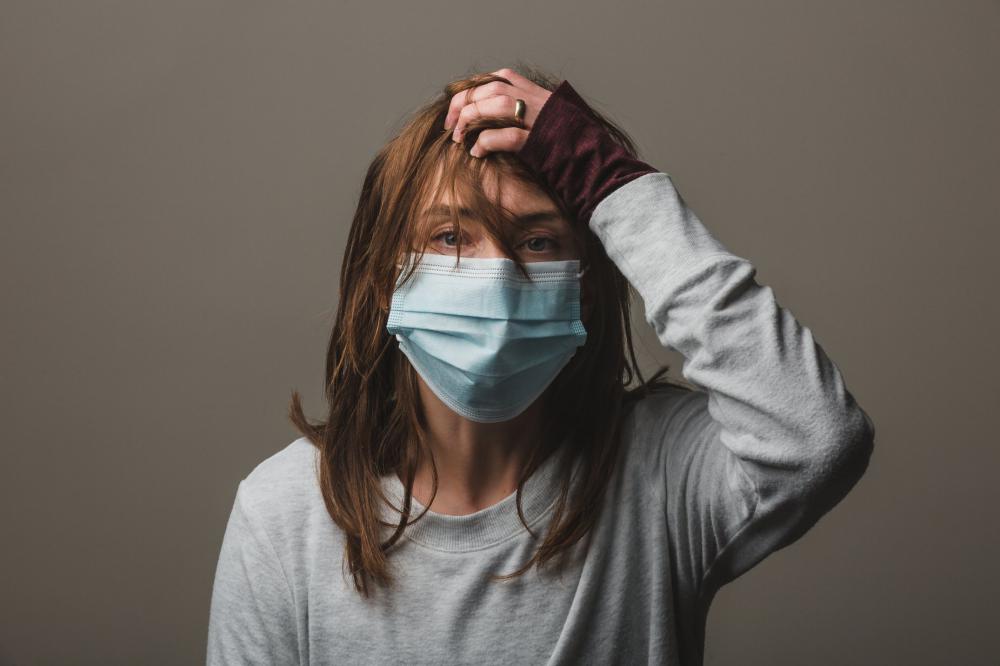 Woman With A Face Mask Photo Woman With A Face Mask Photo