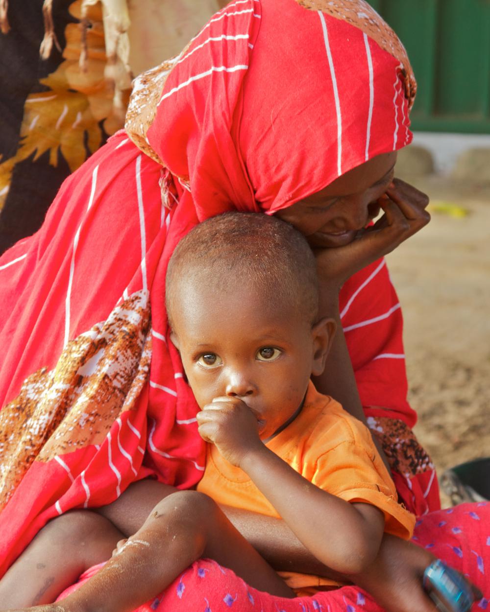 people, child, kid, infant, baby, boy, thumb sucking, woman, mother, son, family, facial expression, look people, child, kid, infant, baby, boy, thumb sucking, woman, mother, son, family, facial expression, look
