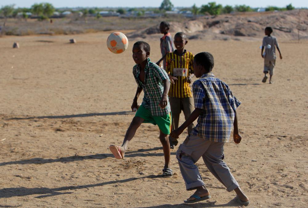 people, children, boys, game, football, players, ball, street soccer people, children, boys, game, football, players, ball, street soccer