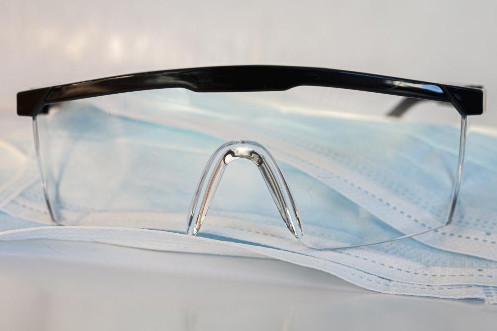 Protective Face Mask And Clear Glasses Photo Protective Face Mask And Clear Glasses Photo
