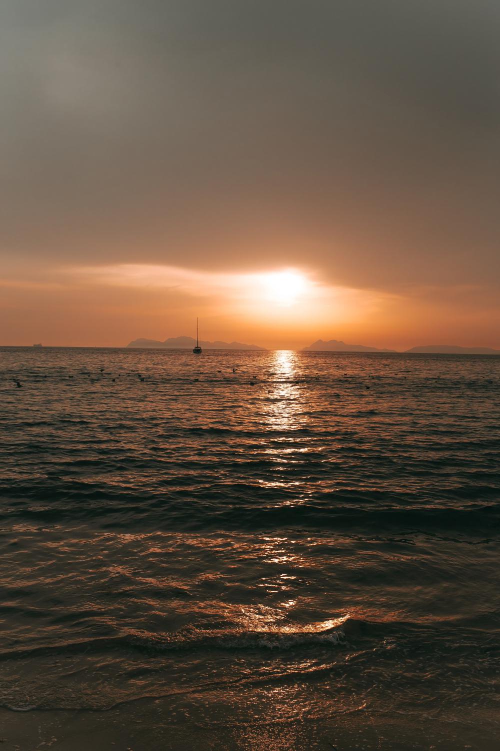 A Boat Sails In Search Of Treasure Photo A Boat Sails In Search Of Treasure Photo