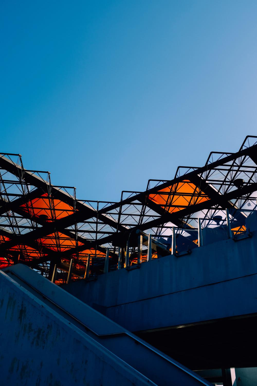 Industrial Building In Orange And Blue Photo Industrial Building In Orange And Blue Photo