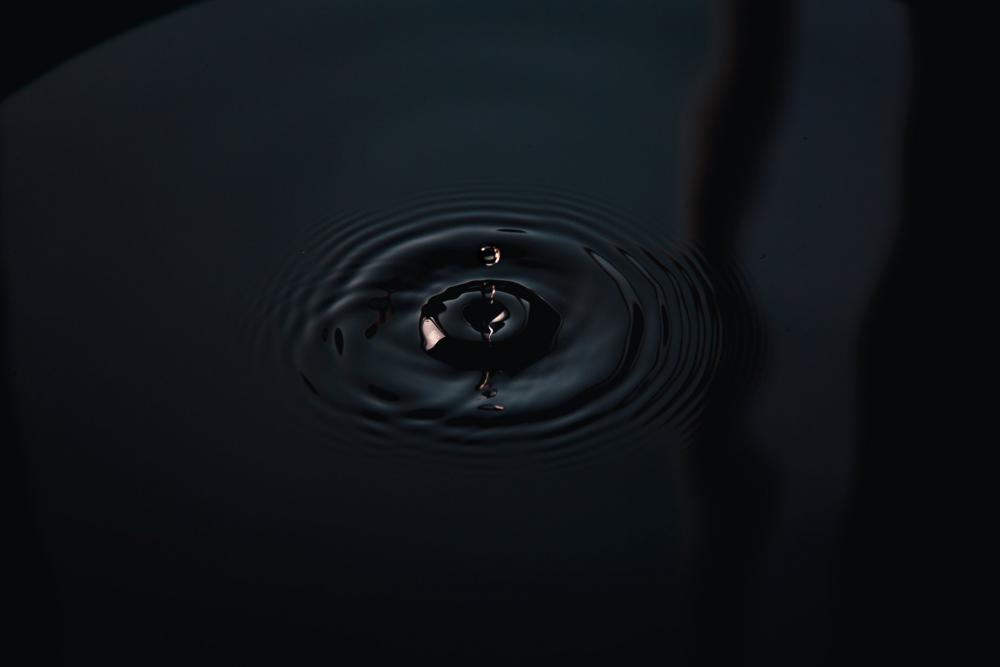 A Single Water Droplet Frozen In Time Photo A Single Water Droplet Frozen In Time Photo