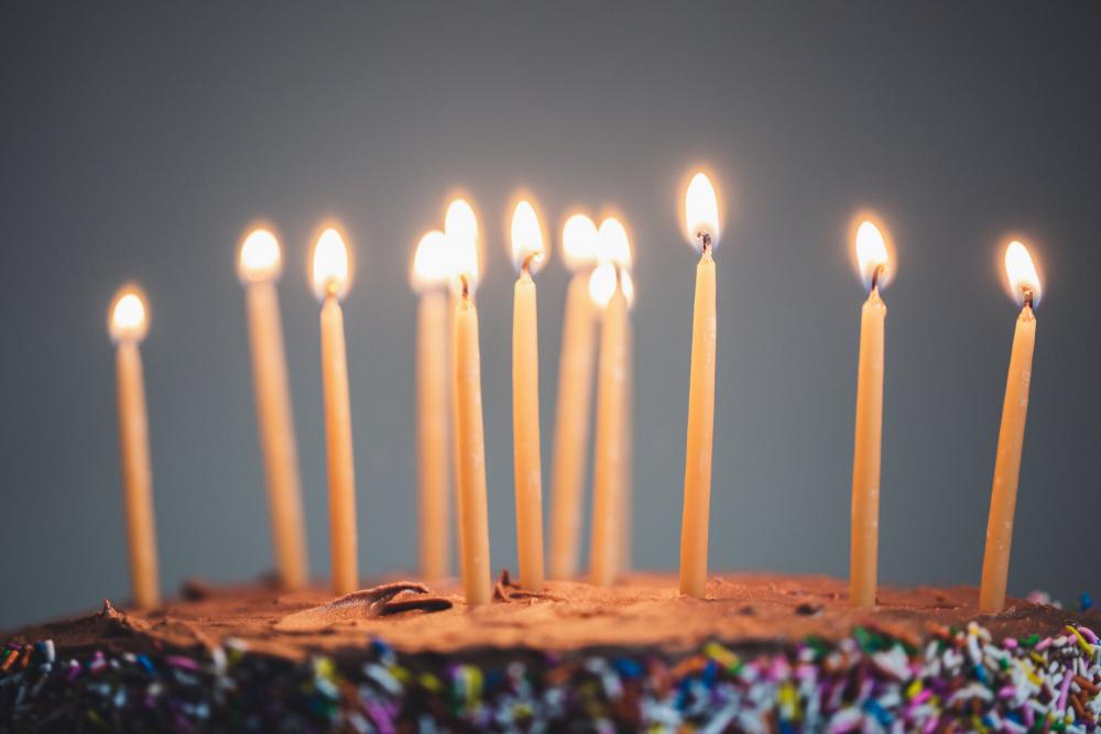 Candles On An Illuminated Chocolate Cake Photo Candles On An Illuminated Chocolate Cake Photo
