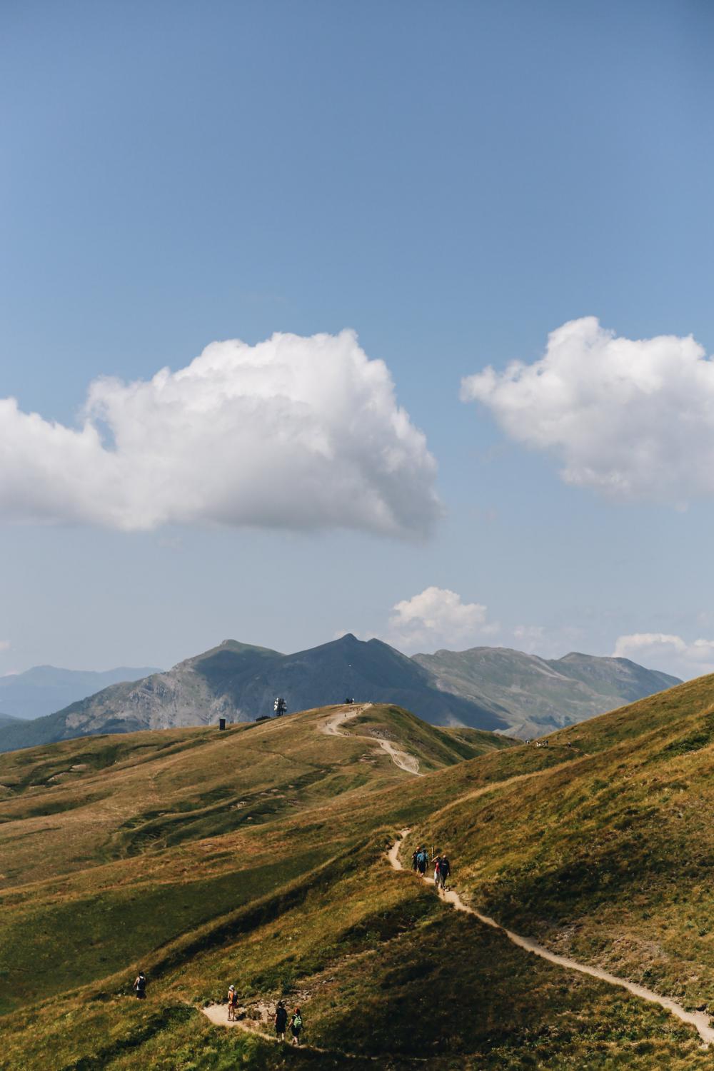 Mountains And Hikers On A Pathway Photo Mountains And Hikers On A Pathway Photo