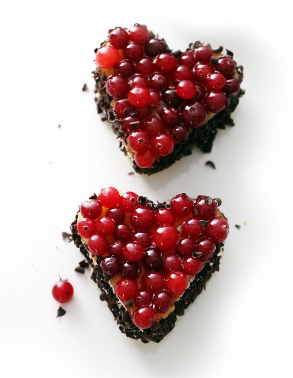 Delicious heart desserts on the table Delicious heart desserts on the table