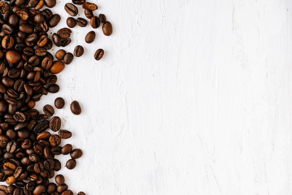 Dark roast coffee beans background Dark roast coffee beans background
