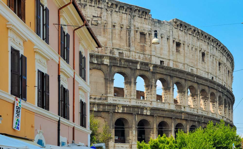 Coliseumn Next To Modern Building In Rome Coliseumn Next To Modern Building In Rome