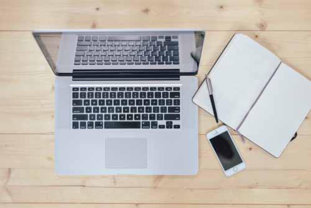 Laptop, Notebook & Smartphone On Wooden Desk Laptop, Notebook & Smartphone On Wooden Desk