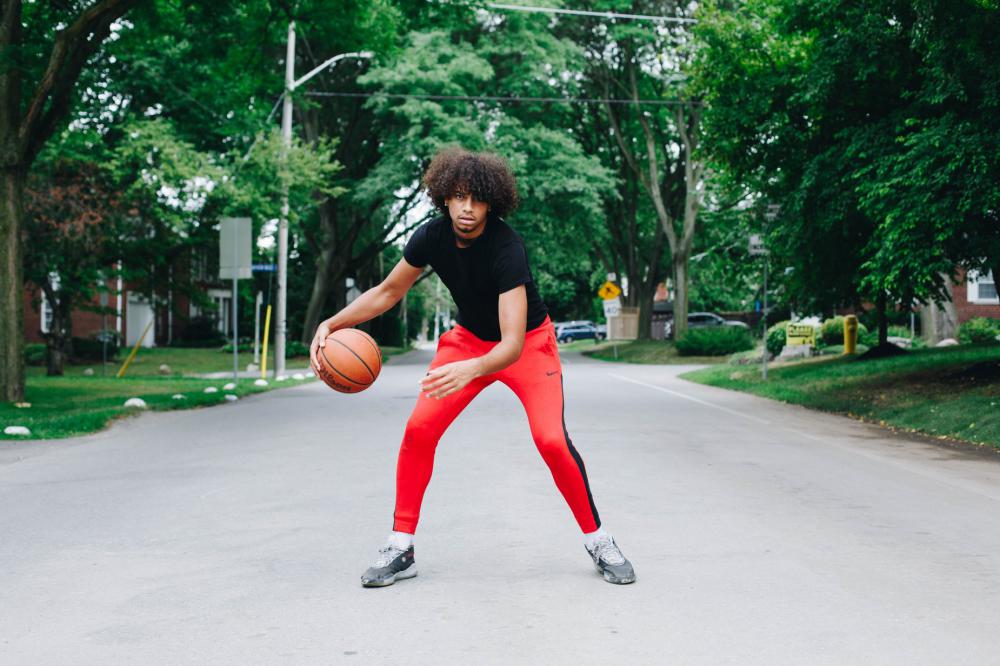 Dribbling A Basketball In The Street Photo Dribbling A Basketball In The Street Photo