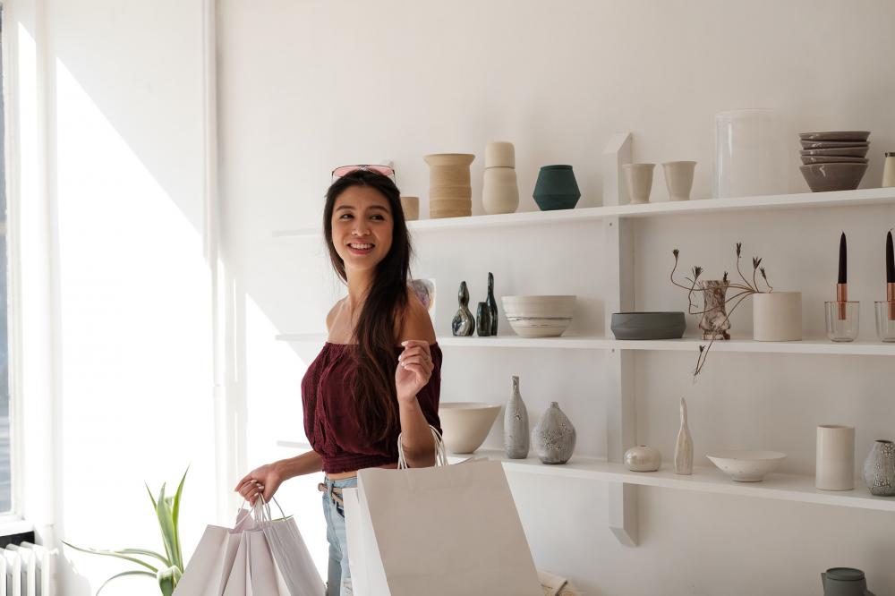 Customer With Shopping Bags In Hand Photo Customer With Shopping Bags In Hand Photo