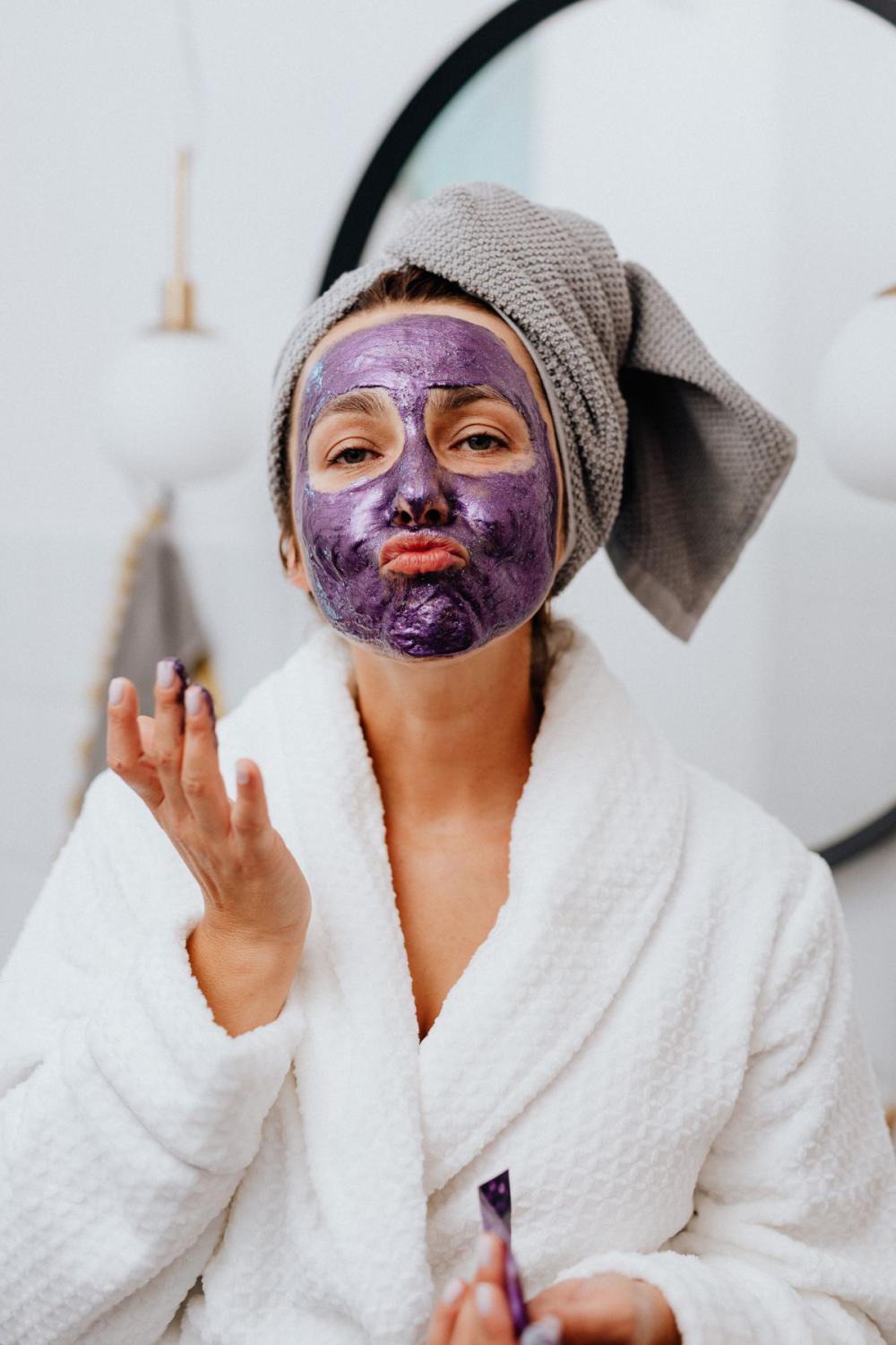 Skincare routine - Middle-Aged Woman in Bathroom Skincare routine - Middle-Aged Woman in Bathroom