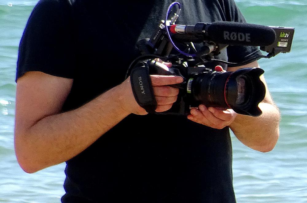 Man Holding Camera Man Holding Camera