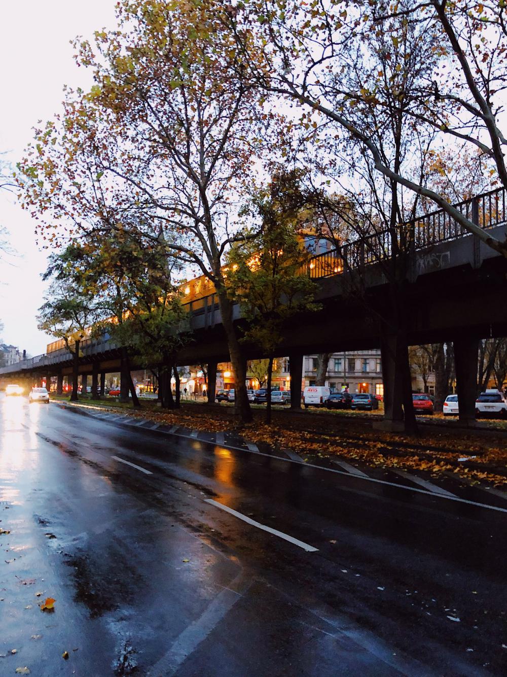 Yellow Train On Track And Rainy Roads Photo Yellow Train On Track And Rainy Roads Photo