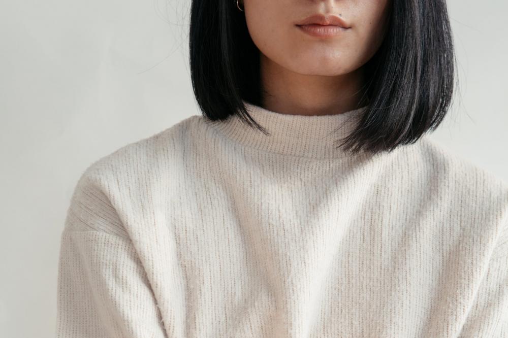 Close Up Showing Detail Of Cream Sweater Photo Close Up Showing Detail Of Cream Sweater Photo