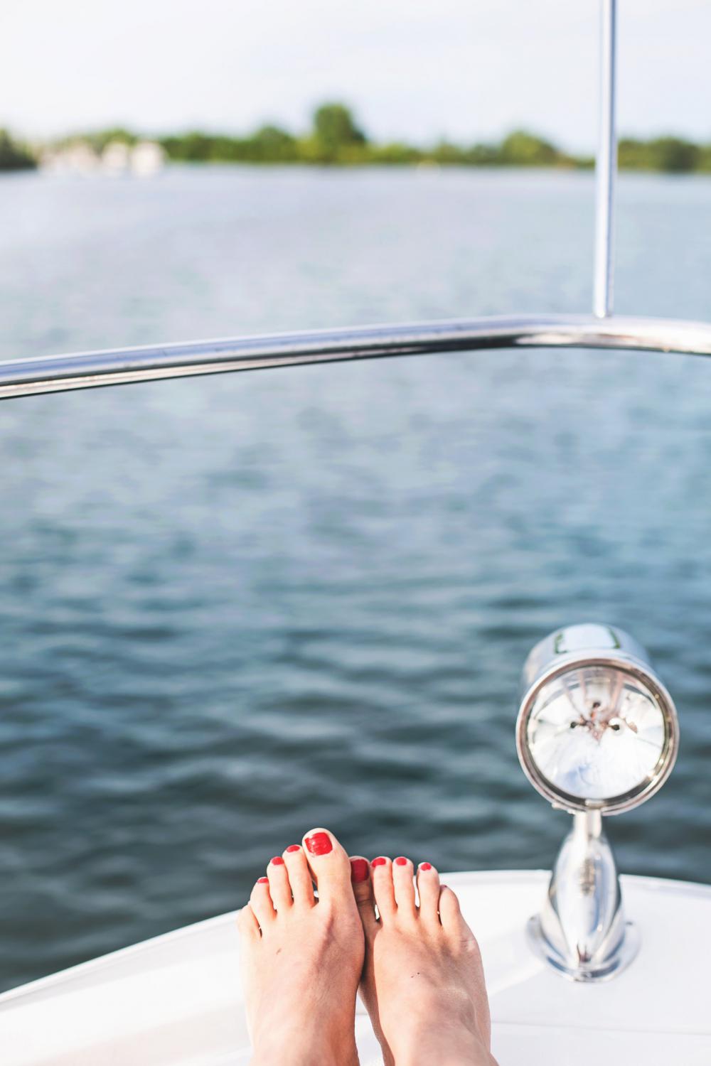 Feet Rest On A Boat Bow Photo Feet Rest On A Boat Bow Photo