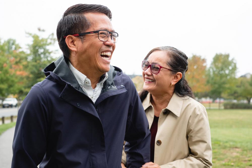 Couple Laugh In A Local Park Photo Couple Laugh In A Local Park Photo