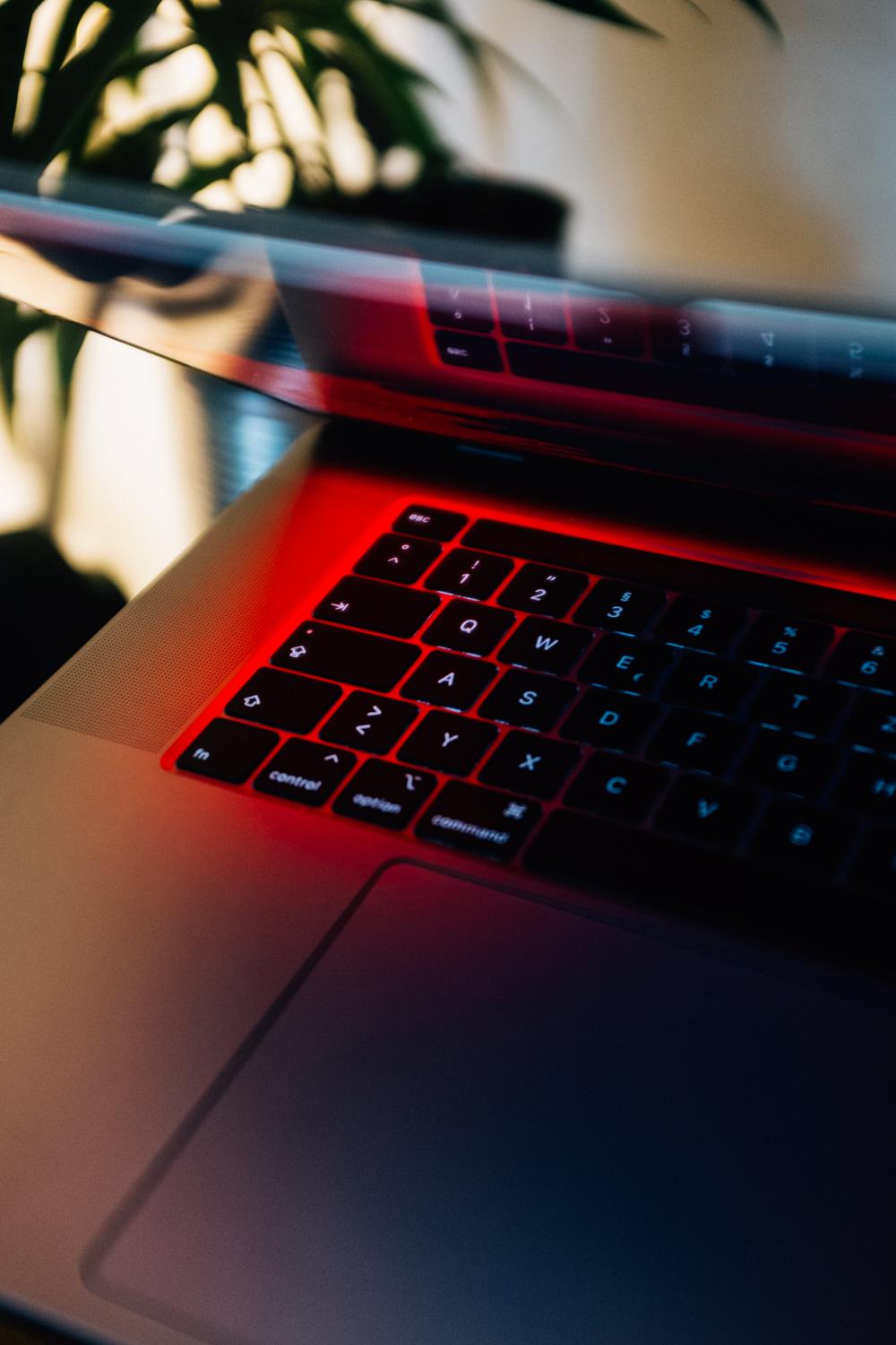 Laptop Keyboard In Red Hue Photo Laptop Keyboard In Red Hue Photo