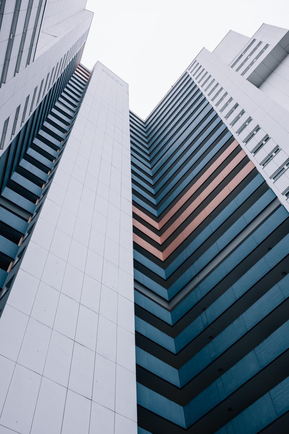 Looking Up At Modern City Building Photo Looking Up At Modern City Building Photo
