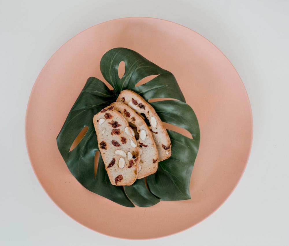 Biscotti Lays In A Monstera Leaf Photo Biscotti Lays In A Monstera Leaf Photo