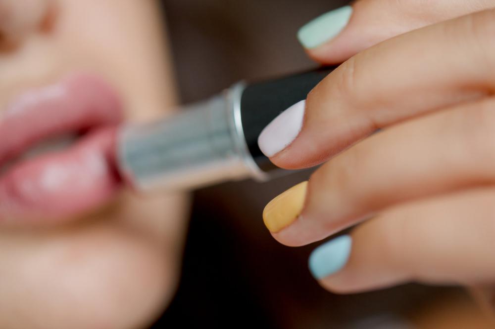Close Up Of Person Applying Lipstick Photo Close Up Of Person Applying Lipstick Photo