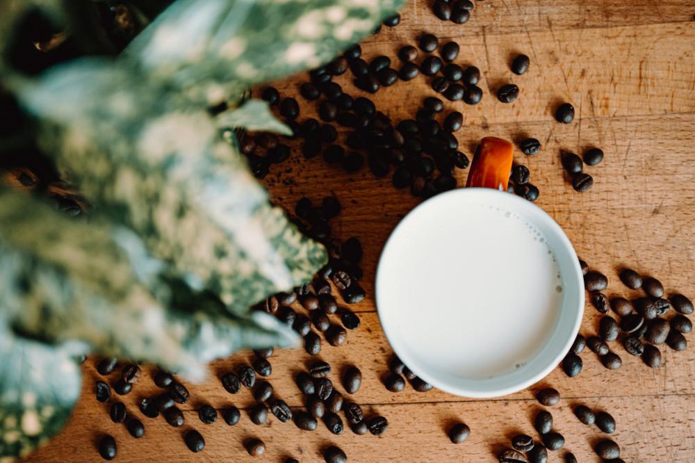 Scattered Coffee On A Wooden Table Photo Scattered Coffee On A Wooden Table Photo