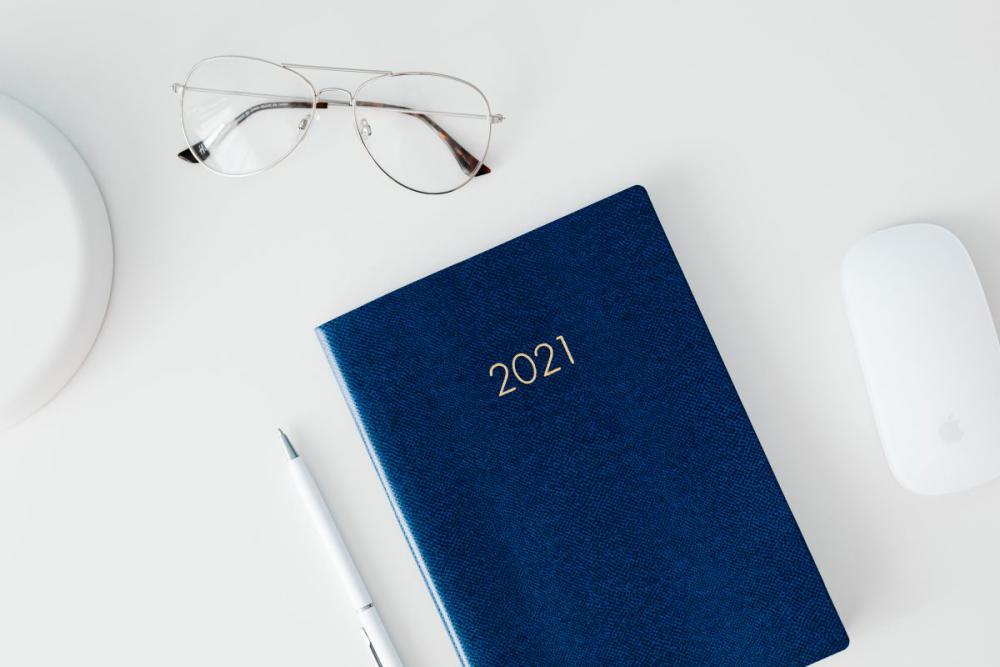 2021 planner on a desk 2021 planner on a desk