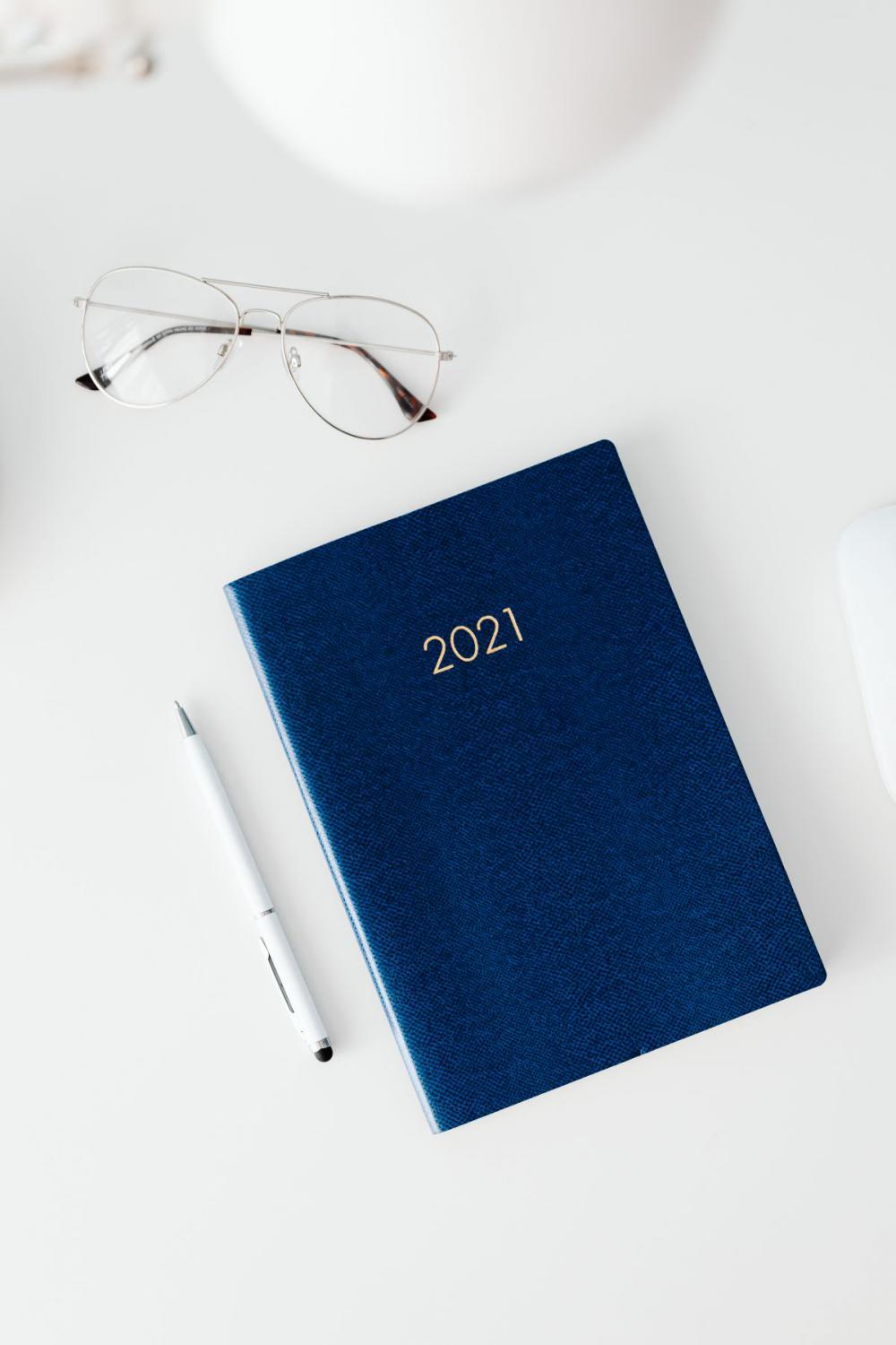 2021 planner on a desk 2021 planner on a desk