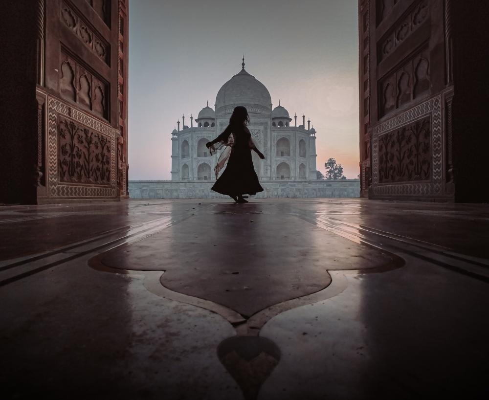 Person Dances In Door Way With A View Of The Taj Mahal Photo Person Dances In Door Way With A View Of The Taj Mahal Photo