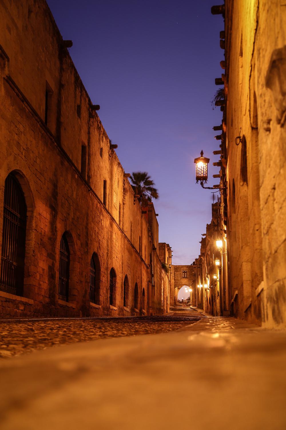 Stone Alleyway Illuminated At Night Time Photo Stone Alleyway Illuminated At Night Time Photo